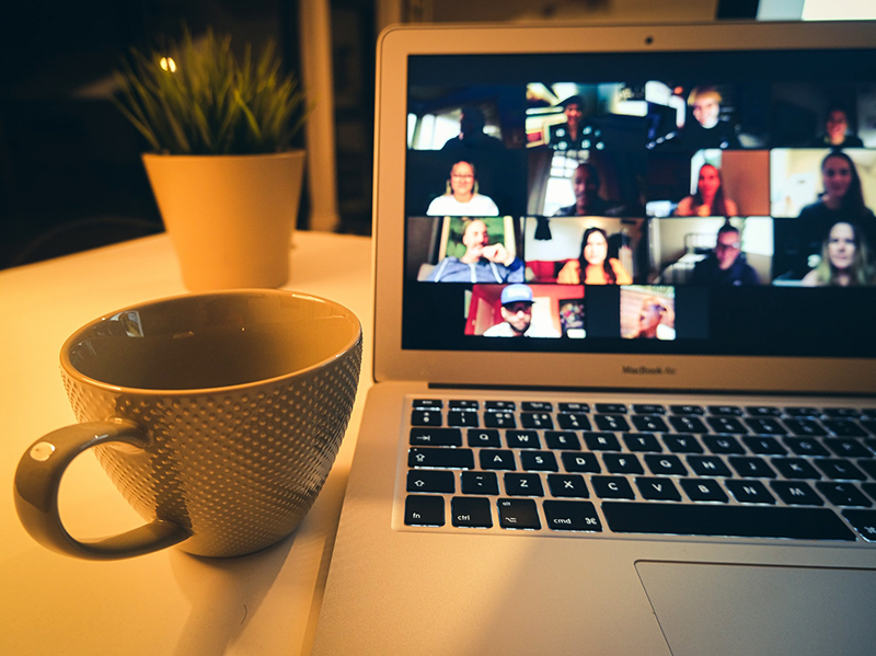 Zoom video call on a mac laptop - VMAGROUP communications, marketing and digital