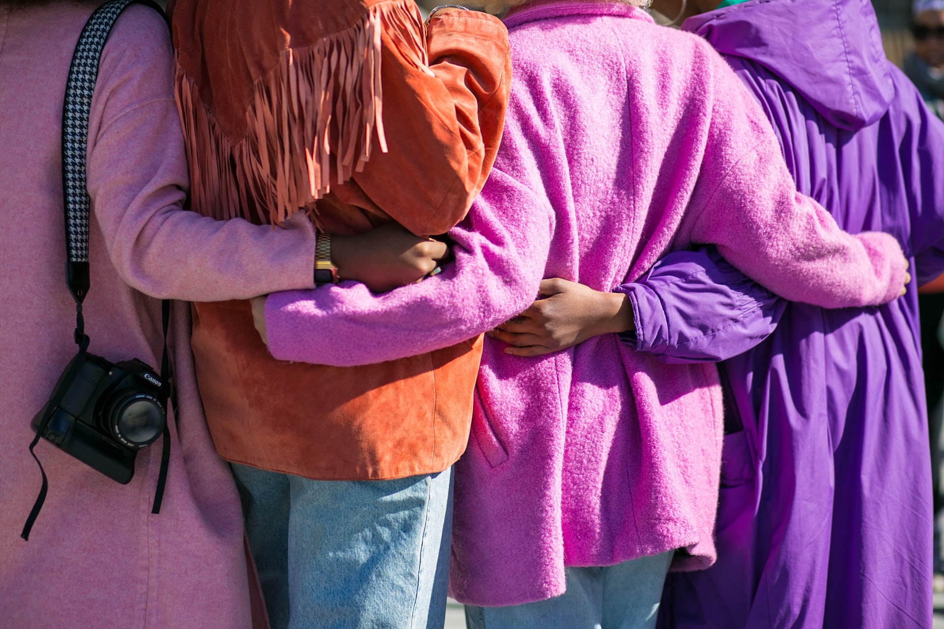 A group of women together linking arms - VMAGROUP - Communications, Marketing and Digital