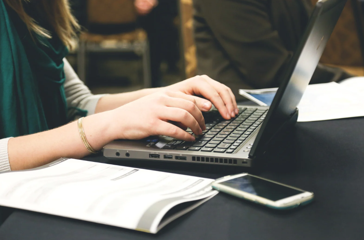 Lady Typing on Computer