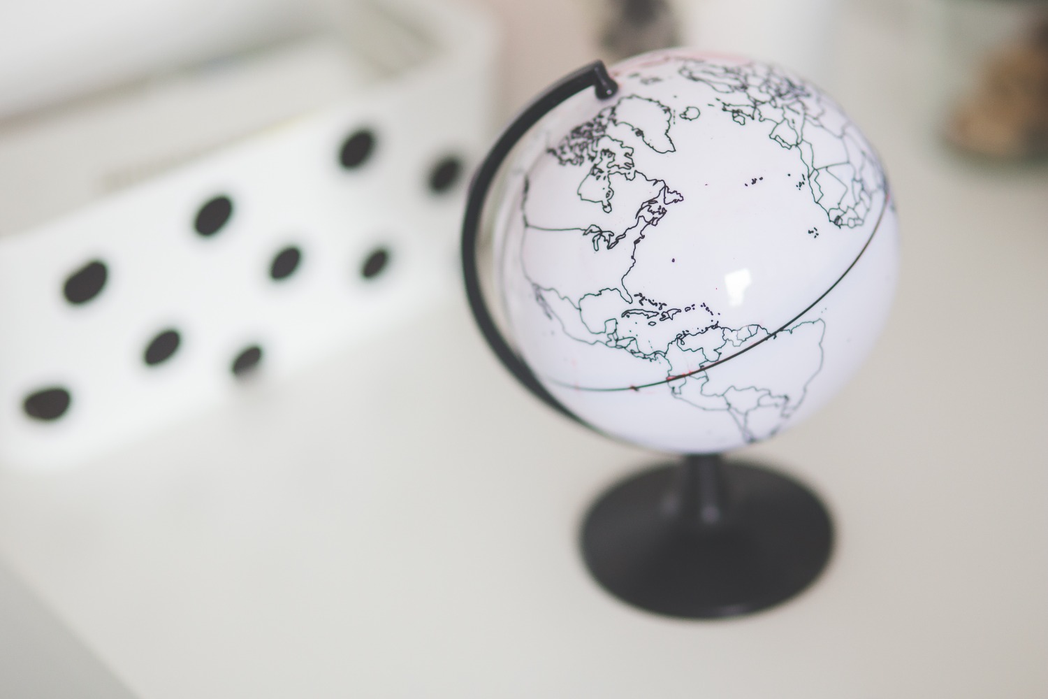 Black and white globe on desk