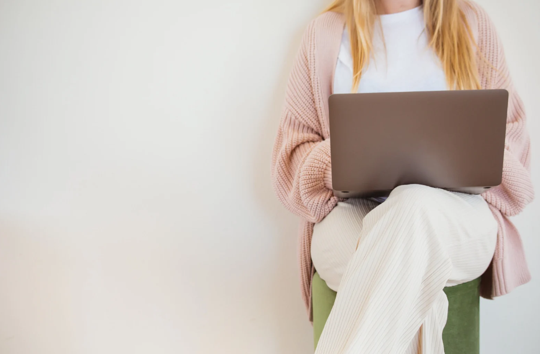 Lady working on laptop at home