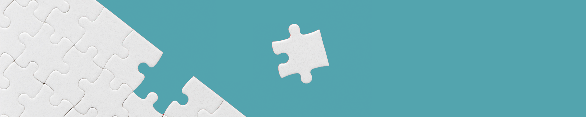 Internal communications after a crisis: Supporting your team with interim hires - Blue jigsaw puzzles fitting together - VMAGROUP